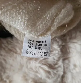 Pull en maille mohair blanc crème à torsades